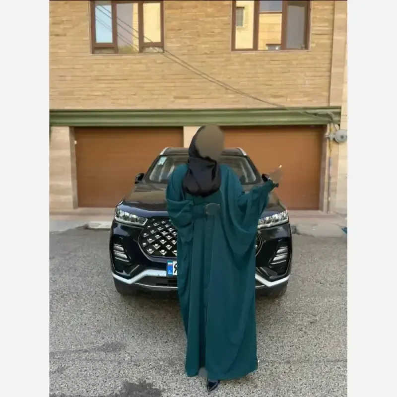 مانتو عبایی طیلا جنس کرپ ندا اماراتی فری سایز رنگ مشکی سبز کرم سرمه ای سیر